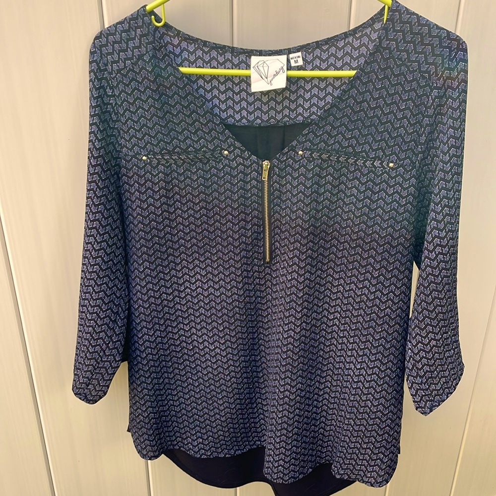 Like new, beautifully accented women’s shirt